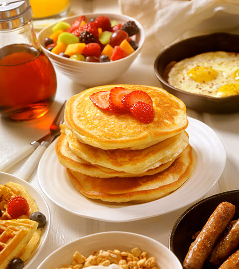 array of breakfast food on the table
