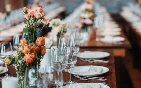 closeup view of a large tables set up for an special occasion 