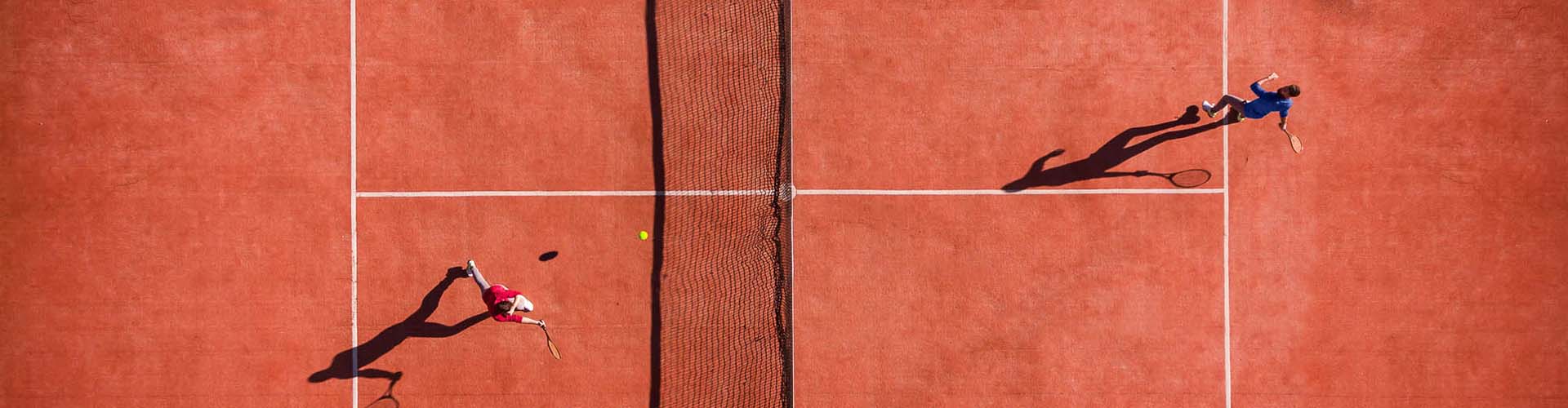 aerial view of two guys playing tennis