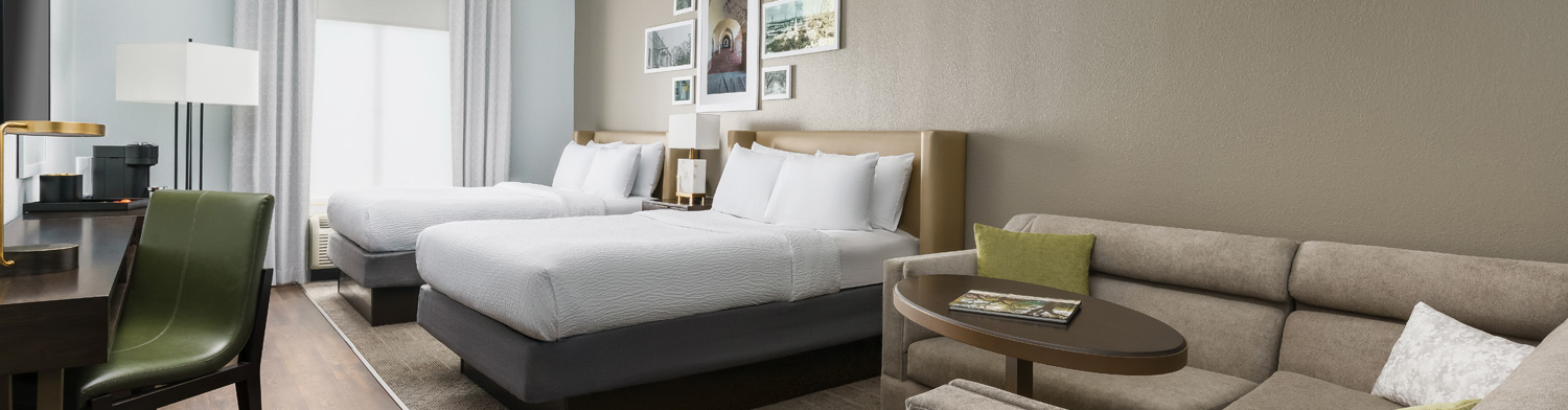 double hotel beds with white comforters